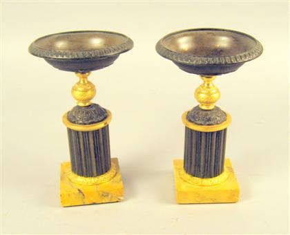 Appraisal: Pair of Continental patinated and gilt bronze tazzae The shallow