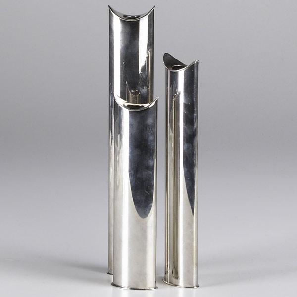 Appraisal: LINO SABATTINI Three modern design candlesticks in silver plate Marked