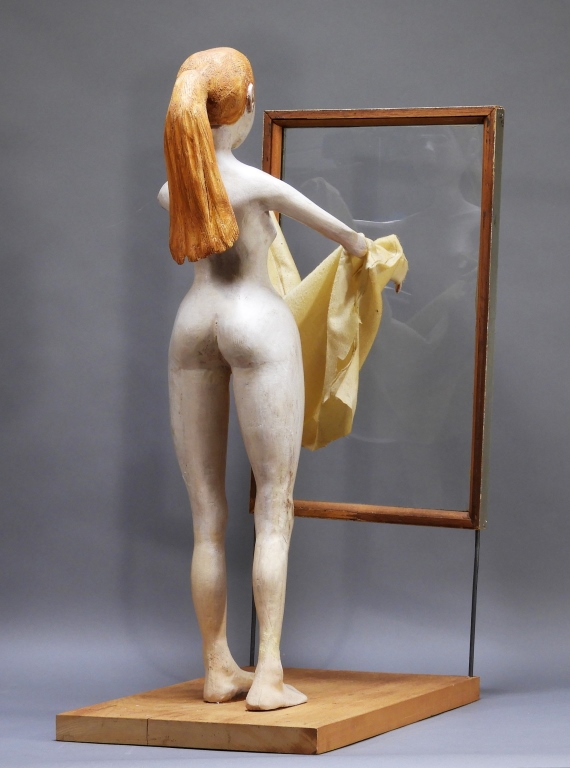 Appraisal: C AMERICAN MCM SCULPTURE OF A NUDE WOMAN United States