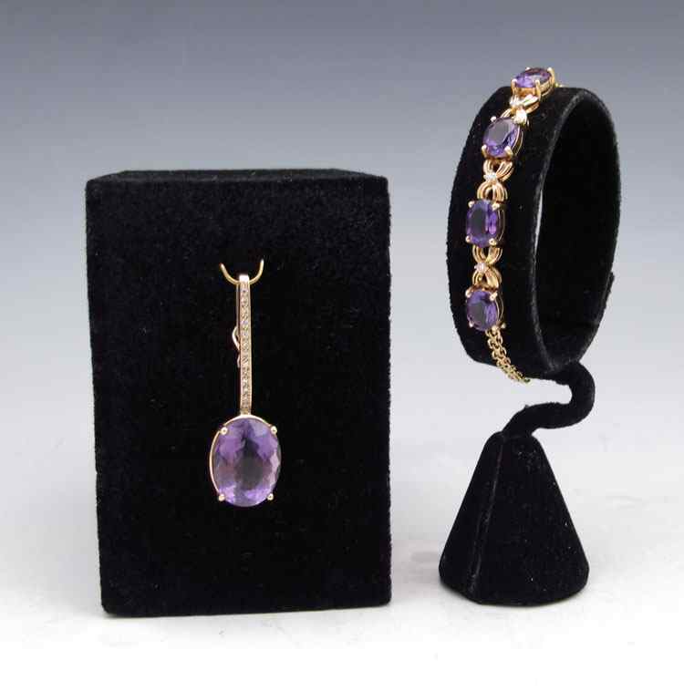 Appraisal: AMETHYST DIAMOND BRACELET ENHANCER PENDANT K yellow gold pendant and