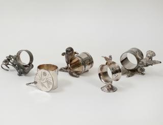 Appraisal: GROUP OF FIVE VICTORIAN SILVER PLATED NAPKIN RINGS American Circa