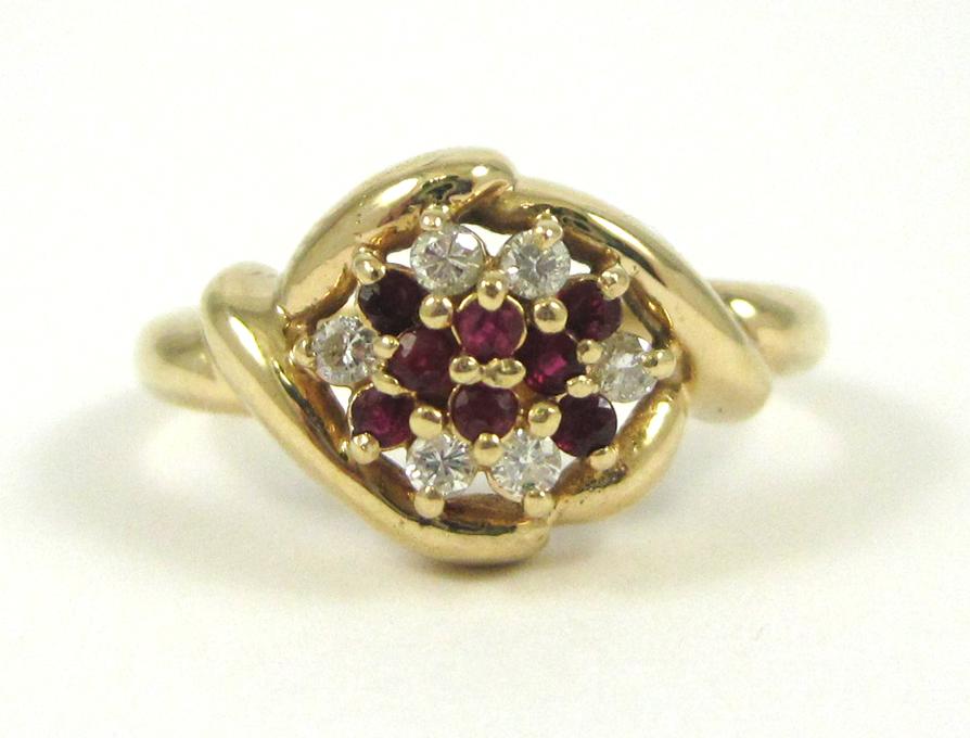 Appraisal: RUBY DIAMOND AND FOURTEEN KARAT GOLD RING set with a