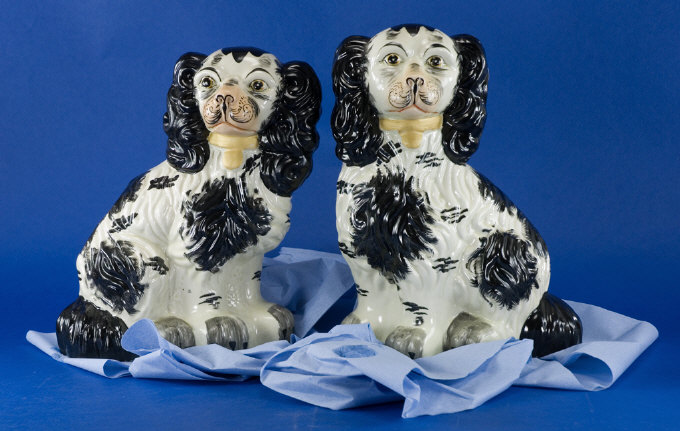 Appraisal: Pair of Staffordshire Dogs Coloured black and white inches in