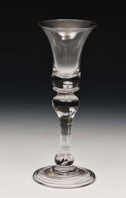 Appraisal: AN ENGLISH WINE GLASS with baluster stem th Century cm