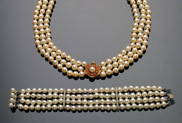 Appraisal: Two cultured pearl necklaces featuring a three strand and a