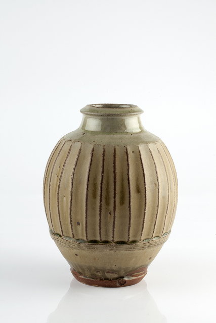 Appraisal: Phil Rogers British b Vaseash glaze and fluted sidesimpressed potter's