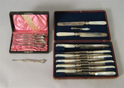 Appraisal: Set of silver plated fruit knives with pearlized handles Together