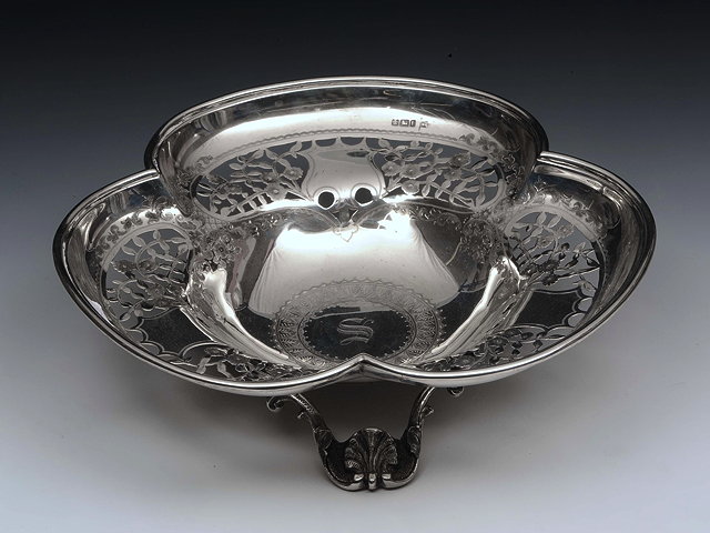 Appraisal: AN EDWARDIAN SILVER TREFOIL SHAPED DISH by Walker Hall Sheffield