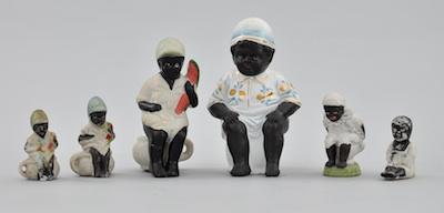 Appraisal: A Collection of Six Black Americana Bisque Figurines Lot consisting