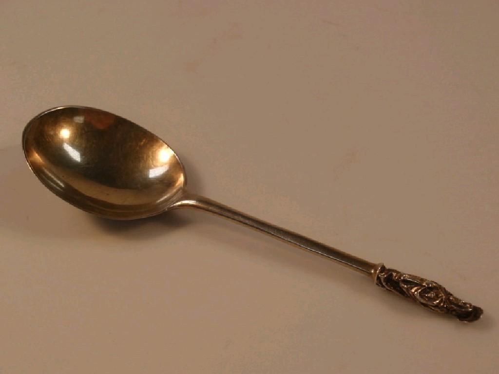 Appraisal: An thC silver-gilt apostle spoon with plain oval bowl and