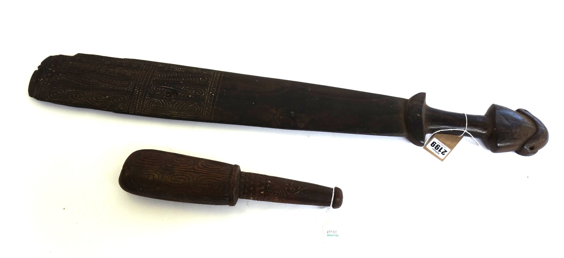 Appraisal: A South Sea Islands ceremonial club of paddle form with