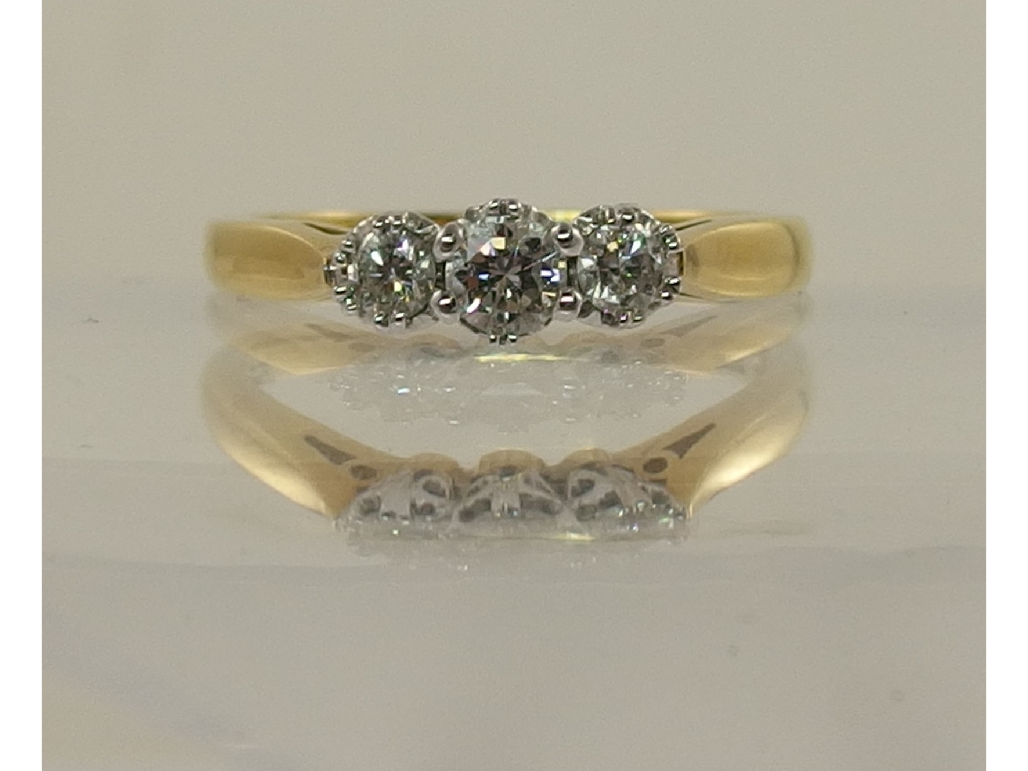 Appraisal: An ct gold three stone diamond ring of approx cts