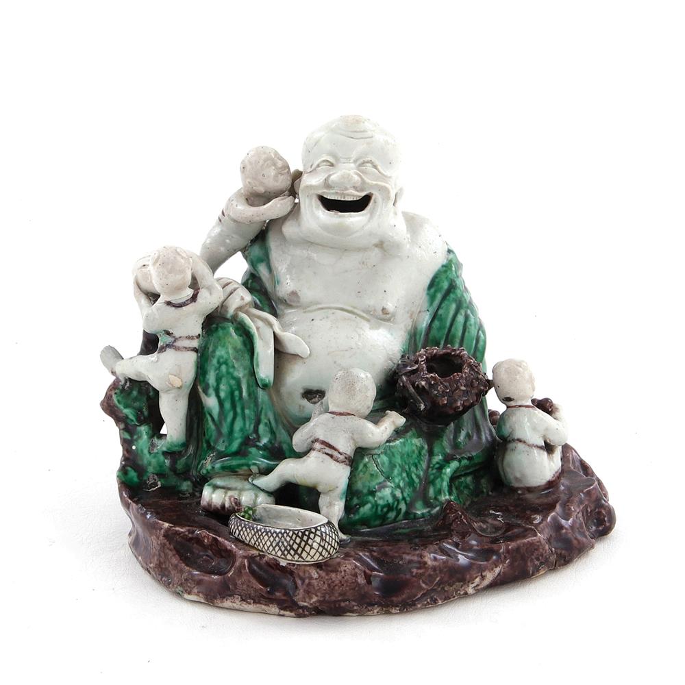 Appraisal: Chinese famille verte biscuit-porcelain Buddha with attendants Qing dynasty probably