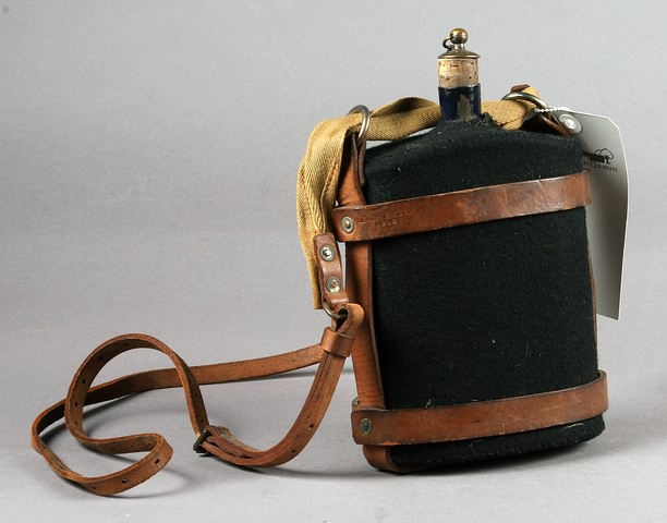 Appraisal: PO canteen with original black cover strap dated