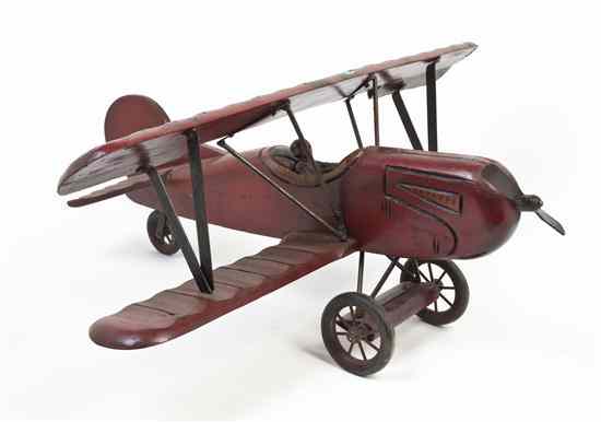 Appraisal: A Carved Wood Model of a Biplane with polychrome paint