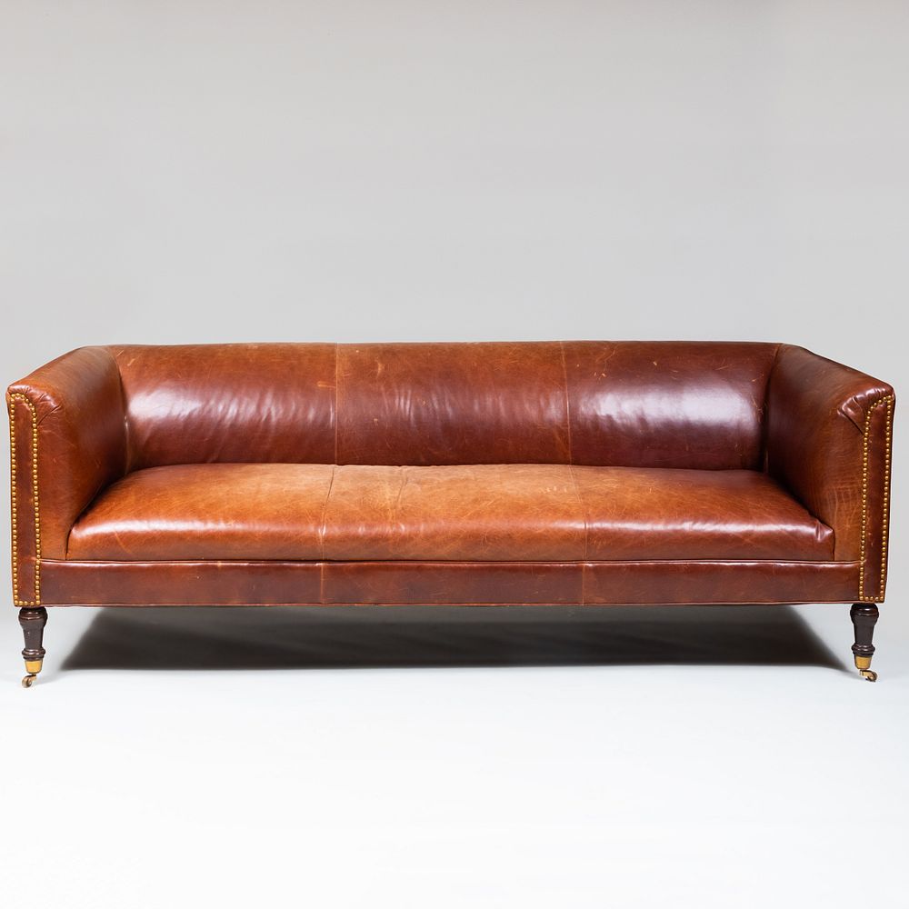 Appraisal: Edwardian Style Brass-Studded Leather Sofa Raised on casters x ft