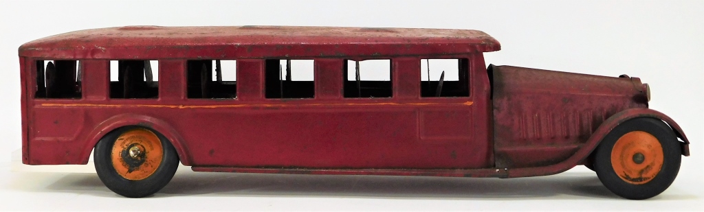 Appraisal: ANTIQUE COR COR TOYS RED PRESSED STEEL BUS United States