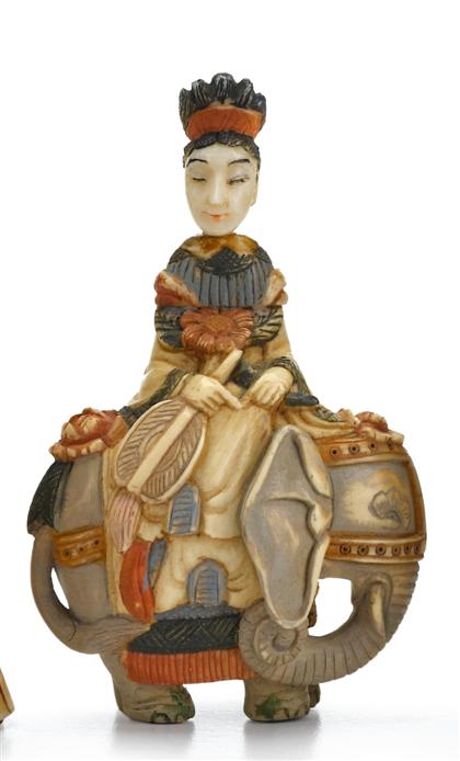 Appraisal: Chinese polychrome ivory snuff bottleModeled as a woman seated on