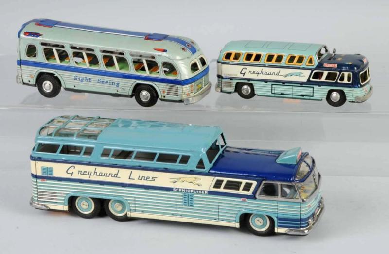 Appraisal: Lot of Tin Bus Friction Battery-Op Toys Description Japanese Working