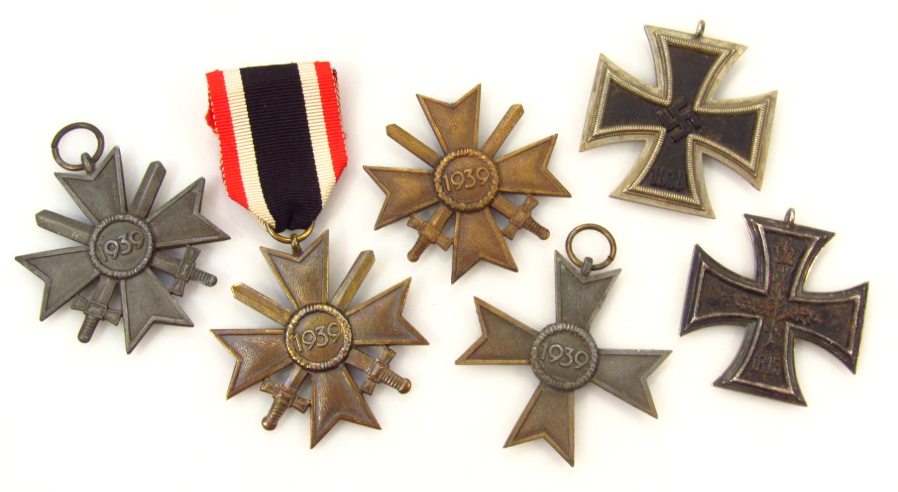 Appraisal: A quantity of various Nazi badges Iron cross cm high