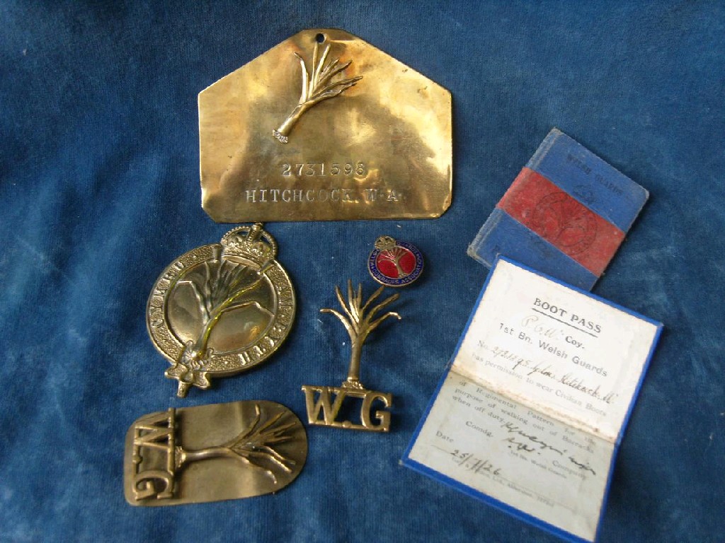 Appraisal: A small collection of brass badges relating to the Welsh