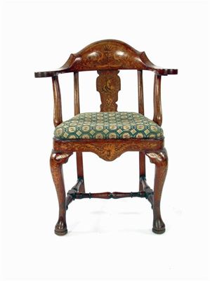 Appraisal: A Dutch walnut and marquetry inlaid open armchair with penwork