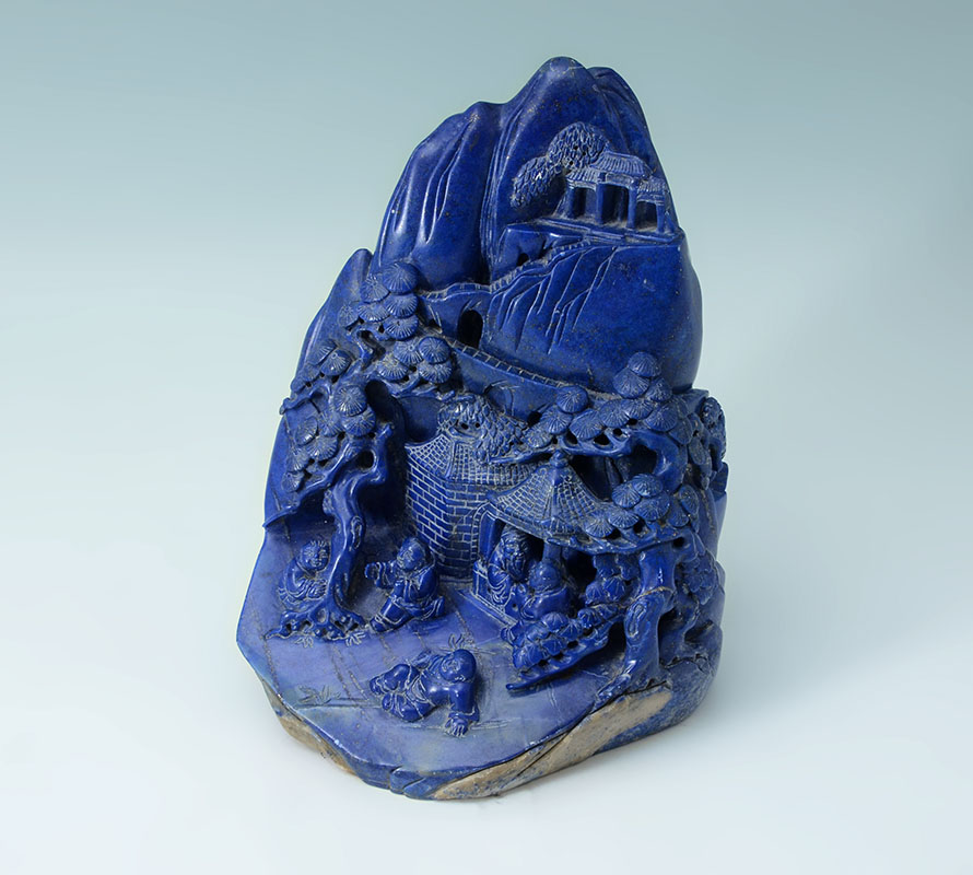 Appraisal: CHINESE CARVED LAPIS LAZULI SCHOLARS MOUNTAIN Carved with figures temples