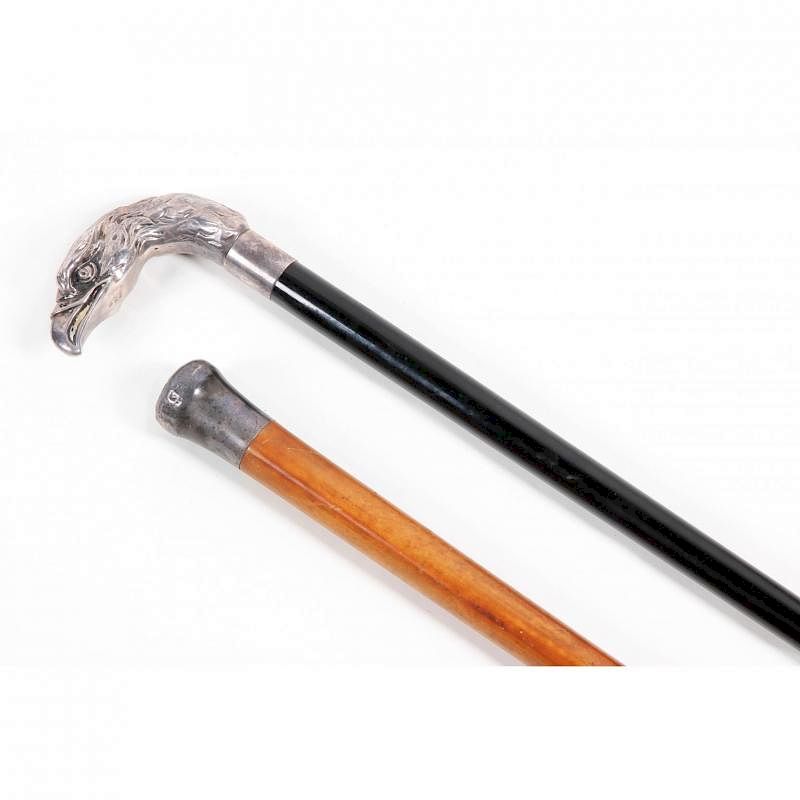 Appraisal: Two Sterling Handled Gentleman's Canes the first with an eagle