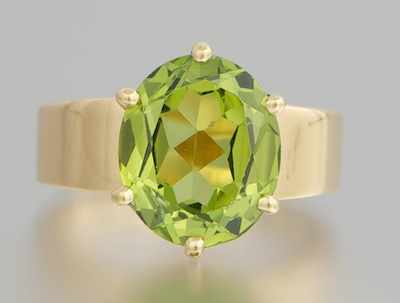 Appraisal: A Ladies' k Gold and Peridot Ring k yellow gold