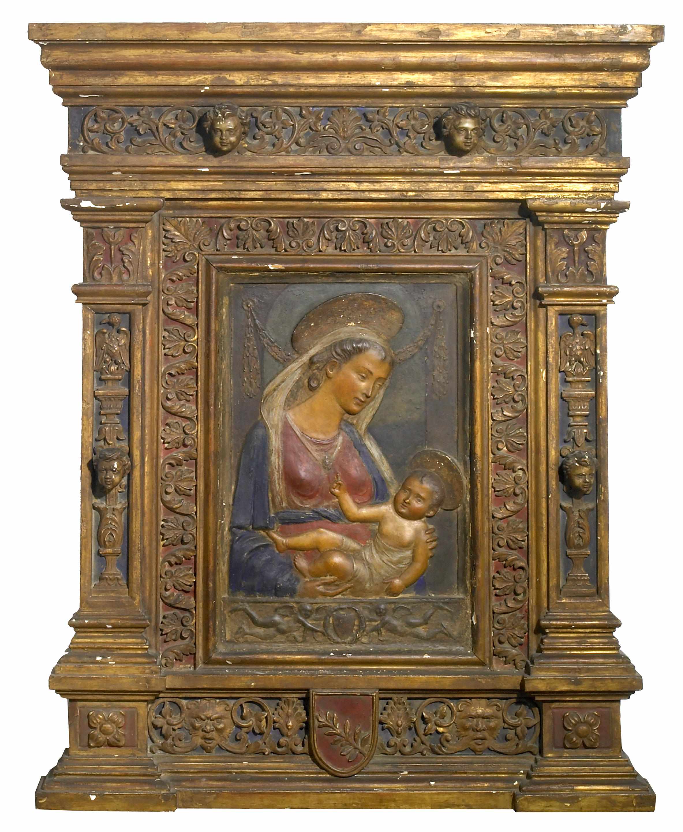 Appraisal: An Italian Renaissance polychrome decorated plaster relief of the Virgin