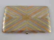 Appraisal: A French silver cigarette case with two colour gold stripes