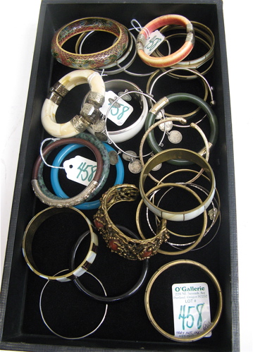 Appraisal: COLLECTION OF TWENTY-FOUR ASSORTED BANGLES Canadian coin dated C Jade