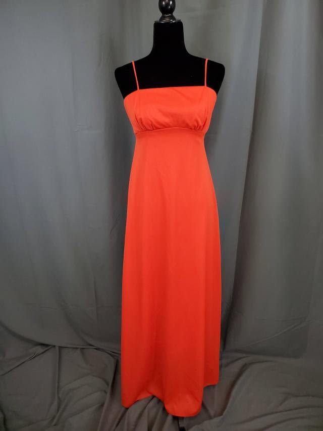 Appraisal: Vintage ladies reddish orange dress in a polyester crepe material