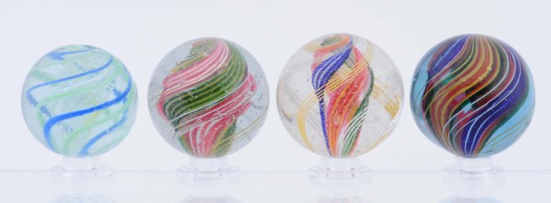 Appraisal: Lot Of Large Swirl Marbles Lot includes one white latticino