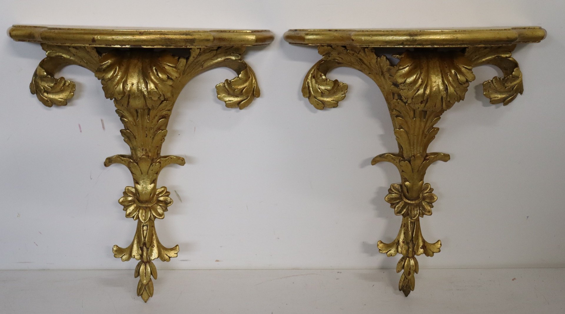 Appraisal: A VINTAGE PAIR OF ITALIAN GILTWOOD WALL BRACKETS Good large