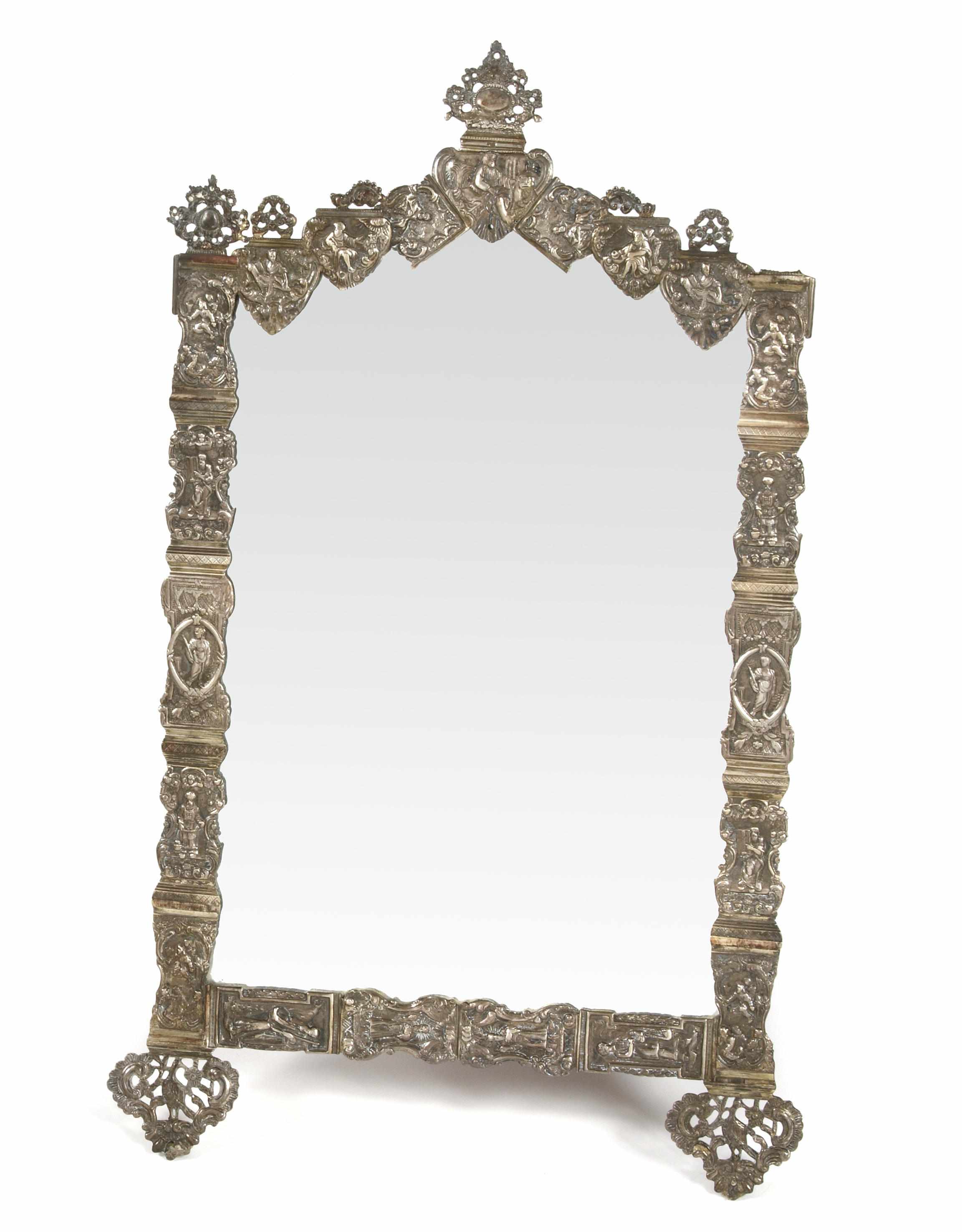 Appraisal: A Continental silvered metal repouss mirror height in width in