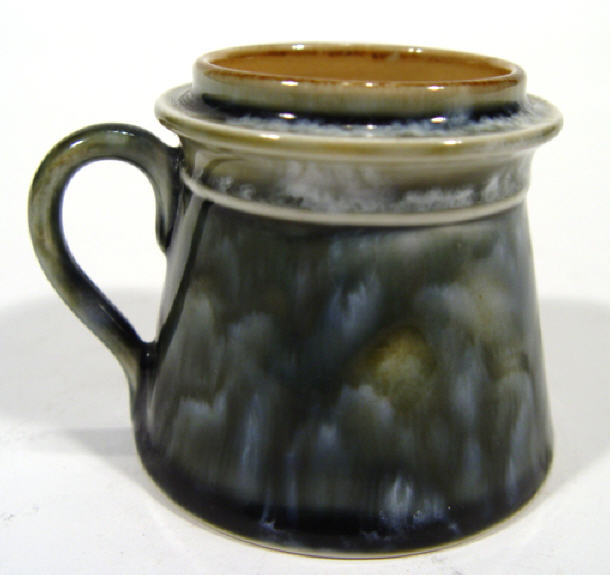 Appraisal: Doulton stoneware salt in the form of a tankard impressed