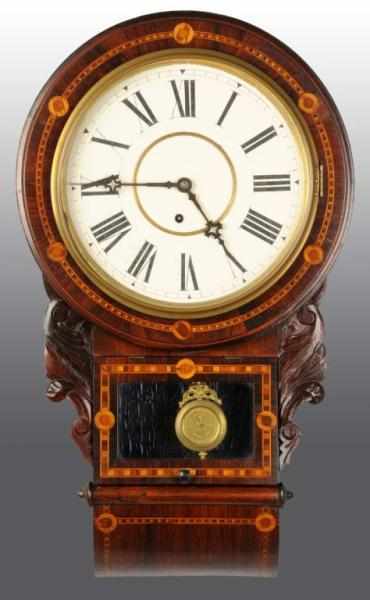 Appraisal: Round Inlay Wall Clock Description Time only Pendulum and key