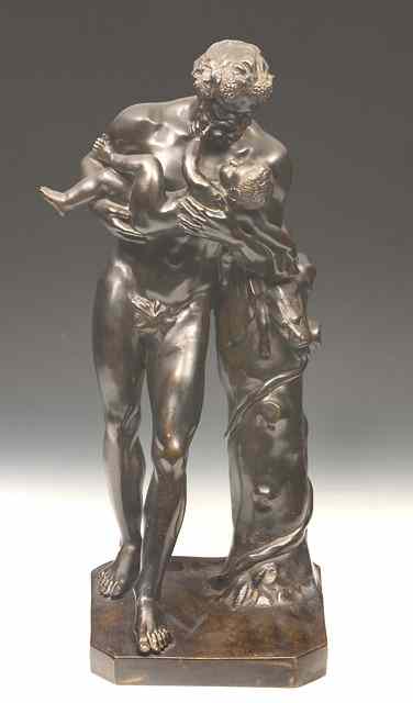 Appraisal: A BRONZE FIGURE of Silenus with child leaning against a