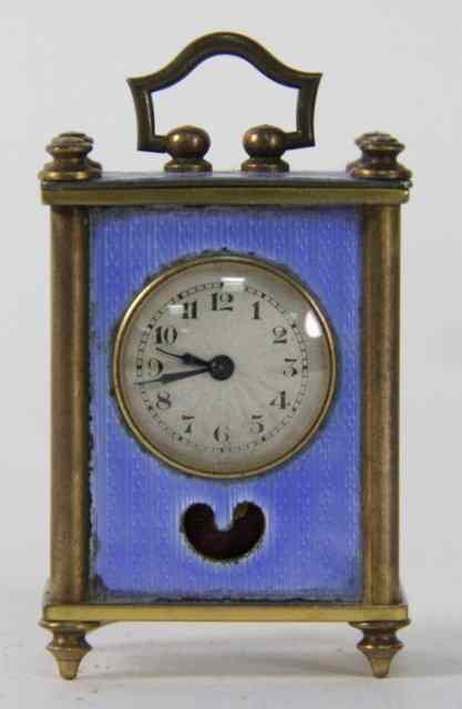 Appraisal: A miniature gilt brass cased and guilloch enamel carriage clock