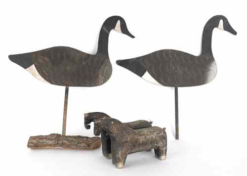 Appraisal: Pair of painted Canada geese lawn ornaments h together with