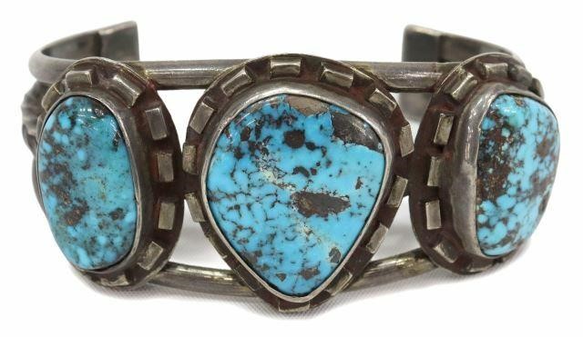 Appraisal: Native American silver content unknown cuff bracelet with three bezel-set