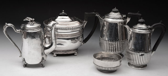 Appraisal: A SILVER VICTORIAN HOT WATER JUG with reeded lower body