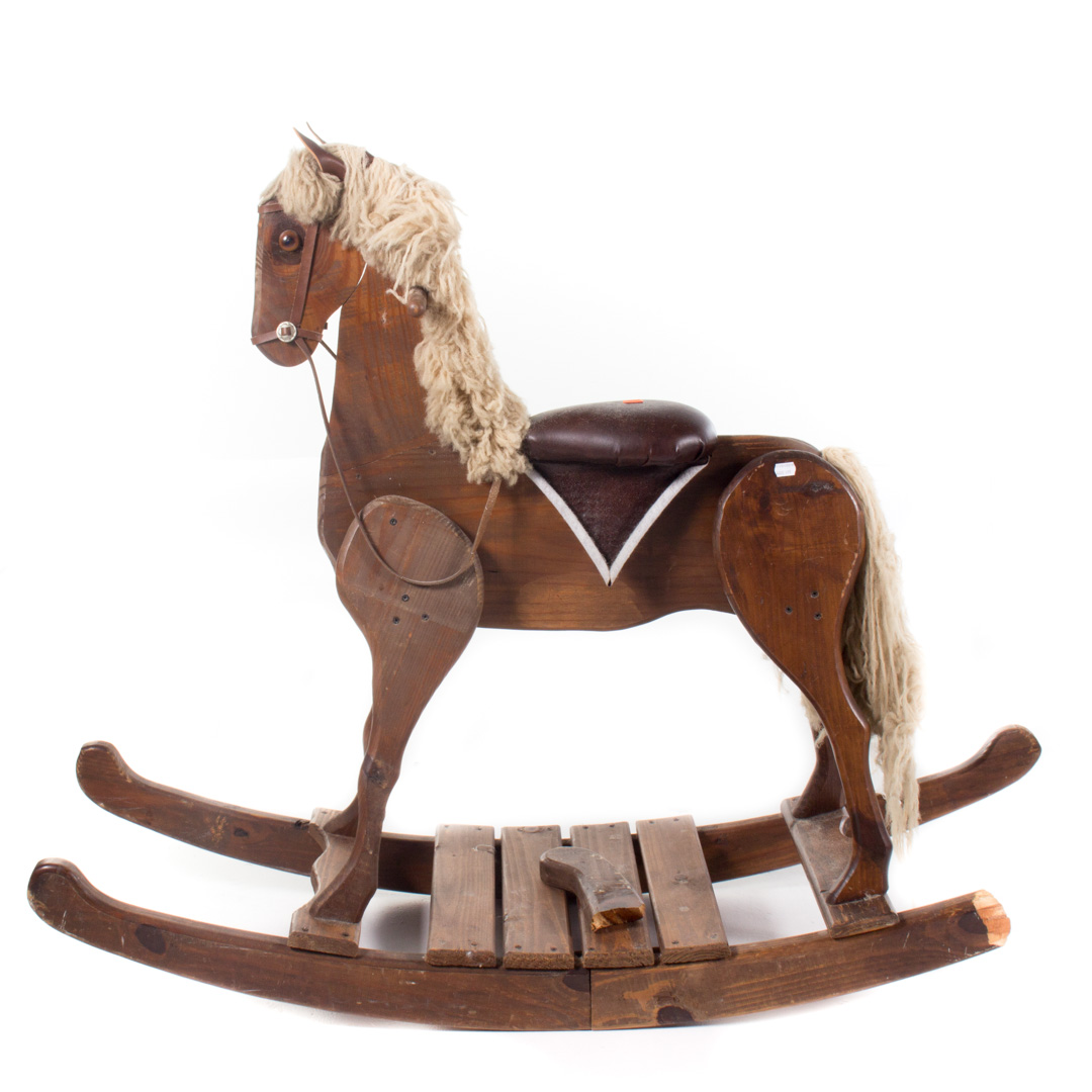 Appraisal: Carved pine child's rocking horse in H Condition heavy wear