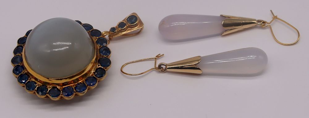 Appraisal: JEWELRY Moonstone and Sapphire Pendant Includes a gilt silver mounted