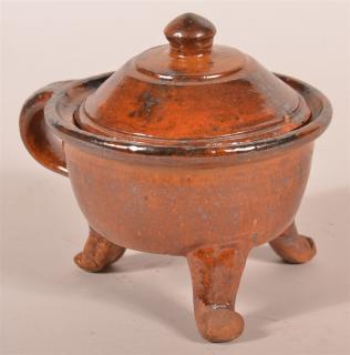 Appraisal: Unusual PA Redware Mottle Glazed Footed Jar with Lid Retaining