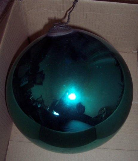 Appraisal: A witch's green glass ball