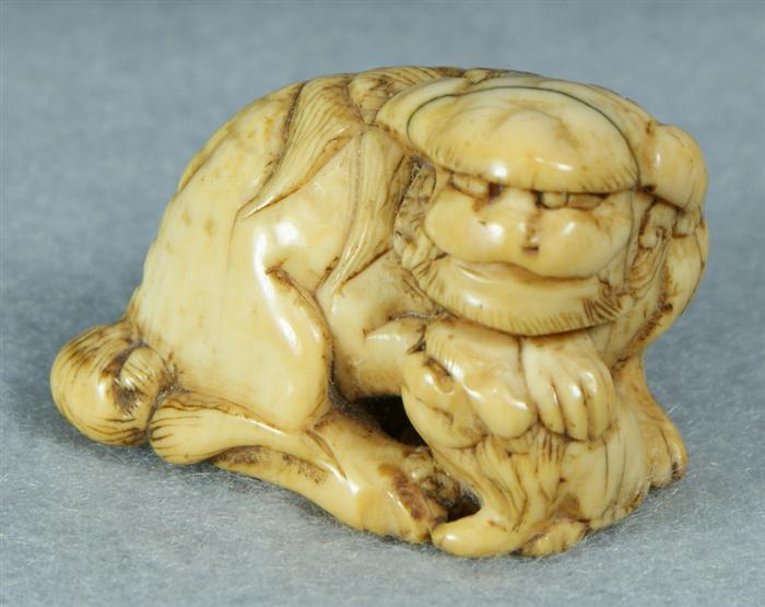 Appraisal: Nicely carved ivory Netsuke Japanese early th c depicting a