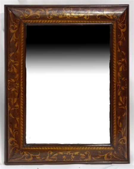 Appraisal: A Dutch walnut and floral marquetry cushion framed wall mirror