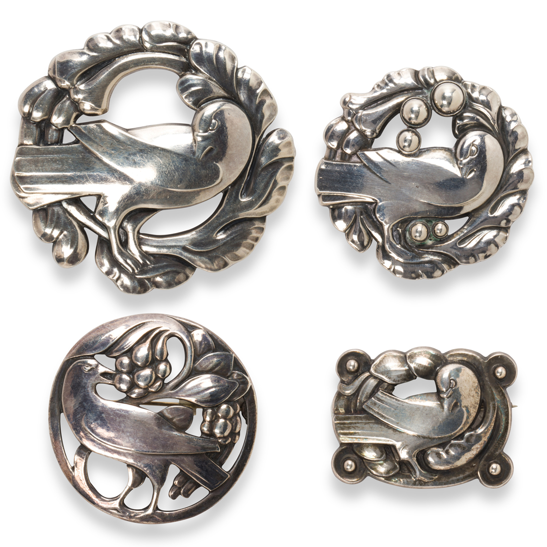 Appraisal: A GROUP OF STERLING SILVER BROOCHES GEORG JENSEN A group